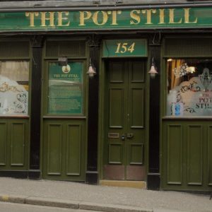 Exterior photo of The Pot Still from Hope Street, Glasgow